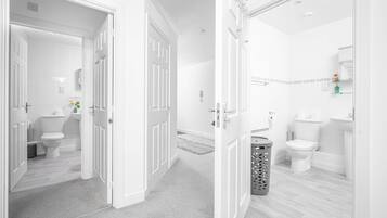 Combined shower/tub, hair dryer, towels, soap