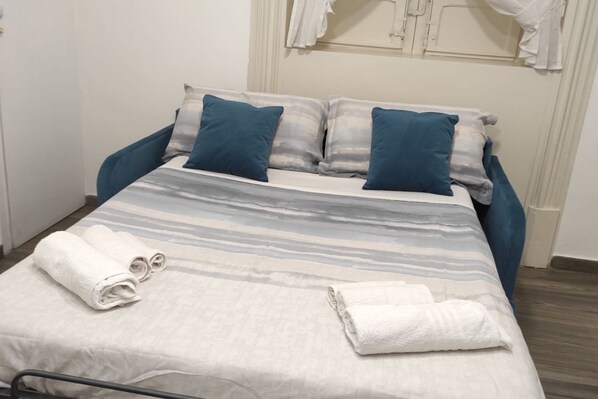 1 غرفة نوم ومكواة/لوح كي وواي فاي وملاءات أسرّة