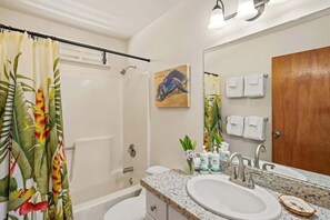 Bathtub, hair dryer, towels