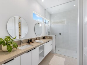 Bathtub, hair dryer, towels, soap