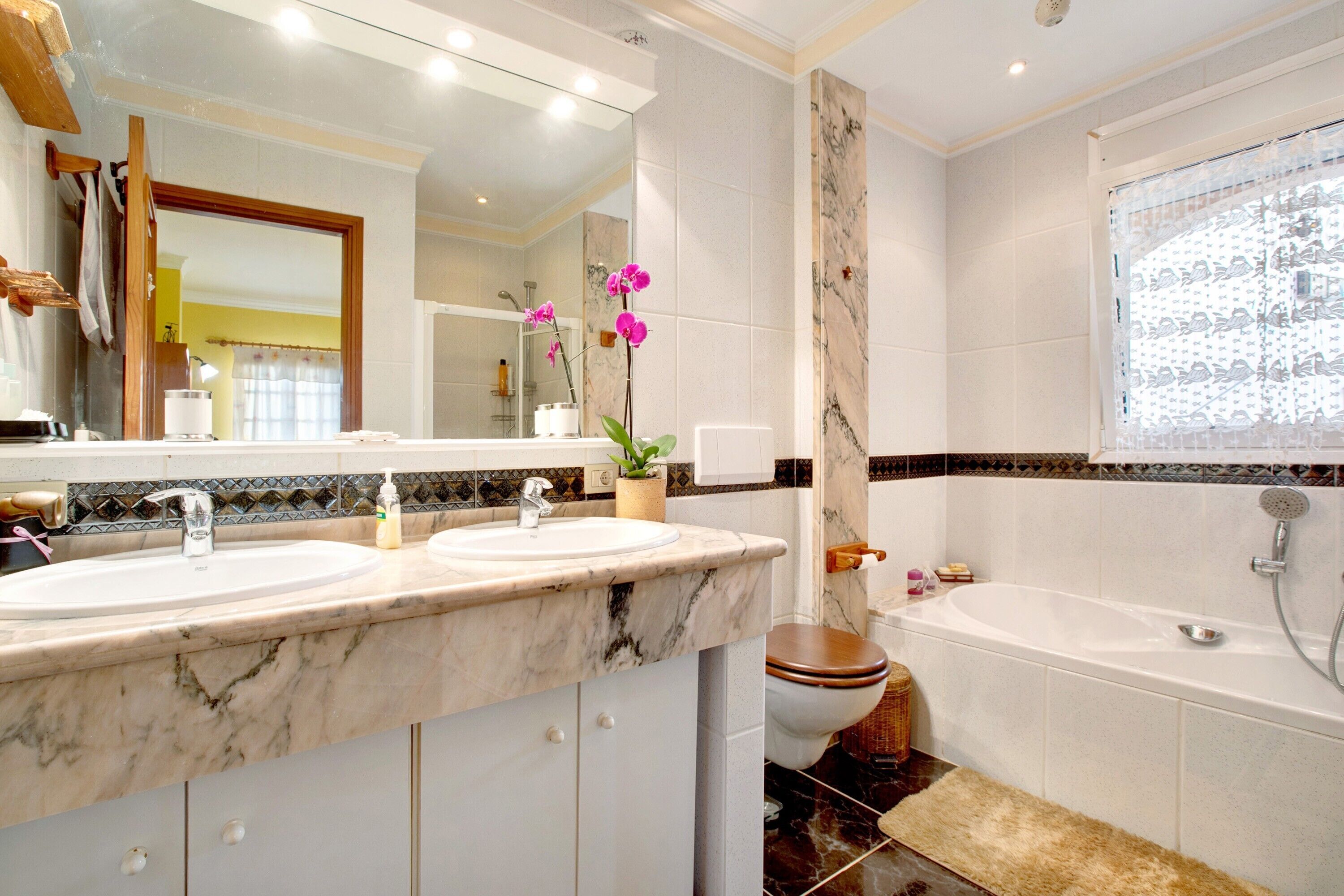 Bathtub, hair dryer, towels