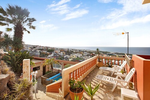 Petite Paradise Vacation Home with Sea Views, Pool, and Wi-Fi