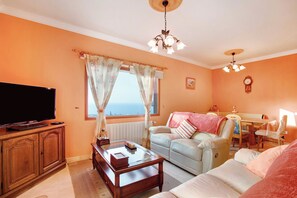 TV, lareira, videogames, DVD player