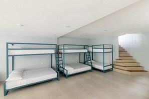 A room with bunk beds, a staircase, and a light-colored floor. - 34 Guests Must Check This Truly Luxury Villa (Quepos)