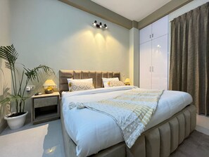 Apartment, 2 Bedrooms | Desk, laptop workspace, blackout drapes, soundproofing - BedChambers Serviced Apartments Gurgaon (Gurugram)