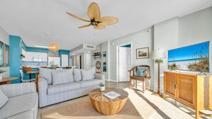 A modern living room with a sofa, coffee table, and a television. - 407 Island Princess~3BR 3Ba Gulf front with Balcony~FREE Beach Service (Fort Walton Beach)