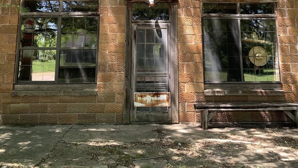 A two-story brick building with a sign reading "Lupus General Store". - Step Back in Time Near The Missouri River (Jamestown)