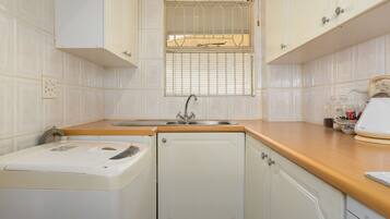 Classic Apartment | Private kitchen | Fridge, microwave, oven, stovetop