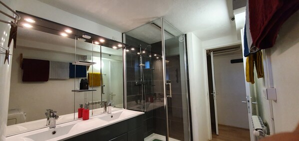 Shower, hair dryer, towels, soap