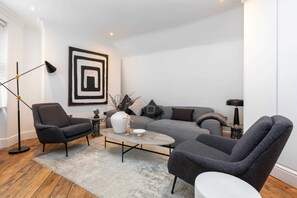 Basic Apartment, 2 Double Beds | Living room | TV