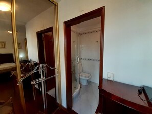 Shower, towels, toilet paper