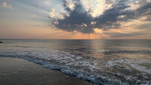A beach with waves and a cloudy sky. - Private Heated Pool - 1 Block from the Beach! (Tybee Island)
