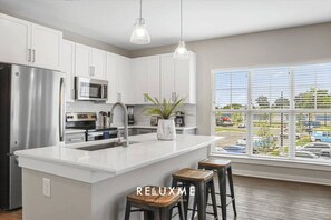 Fridge, microwave, oven, stovetop - Reluxme | 2BR Near Carowinds & Premium Outlets (Charlotte)