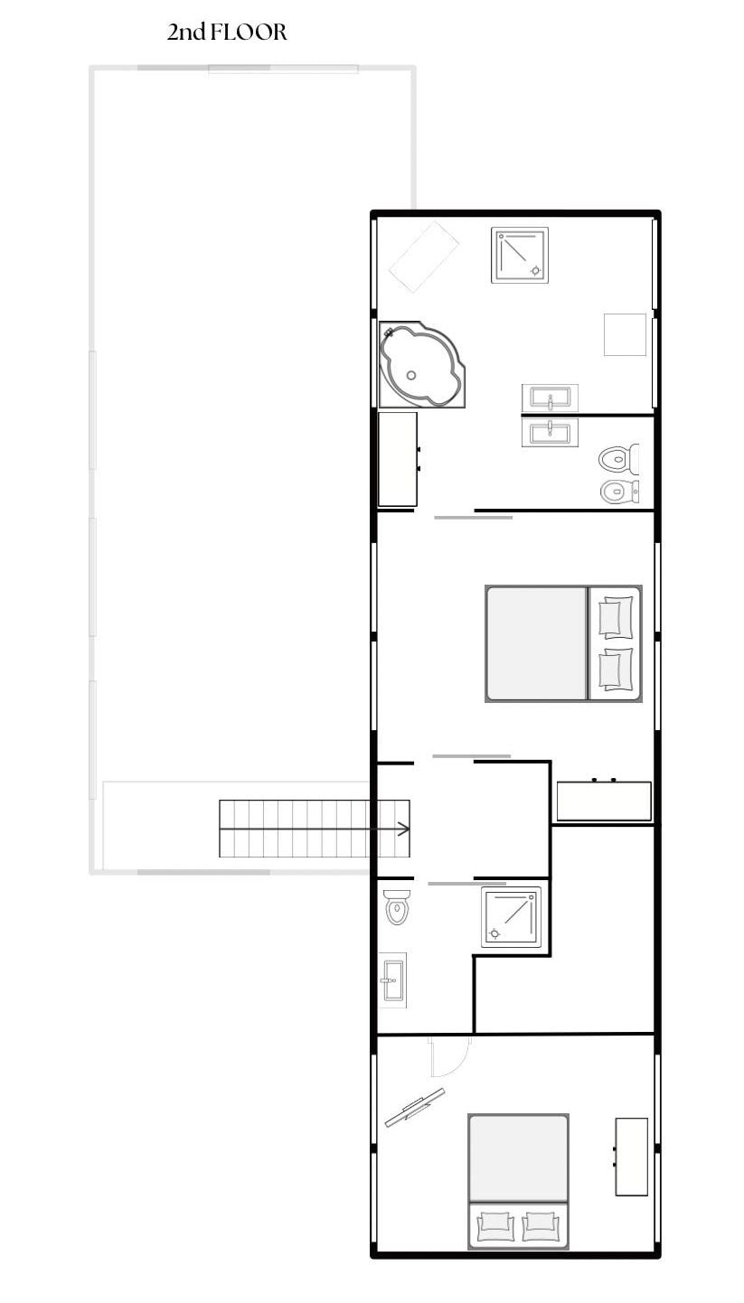 A 2nd floor layout with a large open space, a kitchen area, a bathroom, and a seating area.