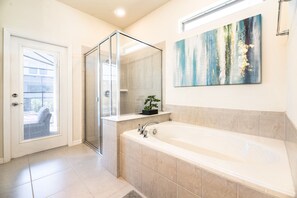 Shower, hair dryer, towels, shampoo