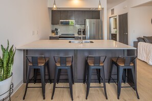 Fridge, microwave, oven, stovetop - Modern condo in Downtown Bozeman w/private balcony, private parking, and AC - SOBO Urban Oasis (Bozeman)