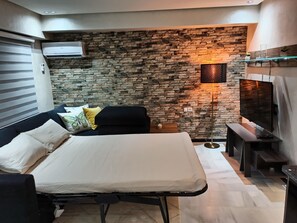 1 غرفة نوم ومكواة/لوح كي وواي فاي مجانًا وملاءات أسرّة