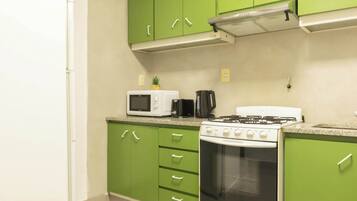 Microwave, coffee/tea maker, toaster, cookware/dishes/utensils