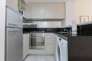 Microwave, coffee/tea maker, toaster, cookware/dishes/utensils