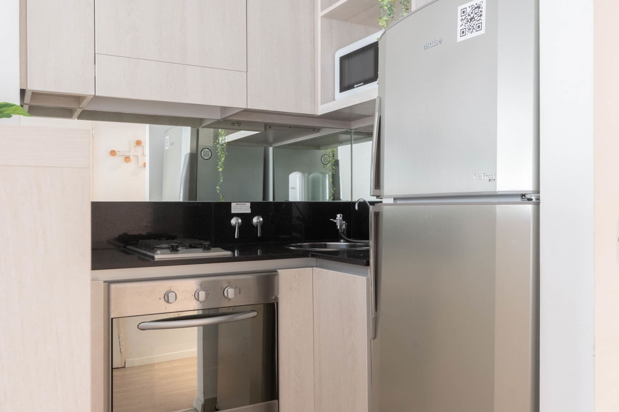 Microwave, coffee/tea maker, toaster, cookware/dishes/utensils