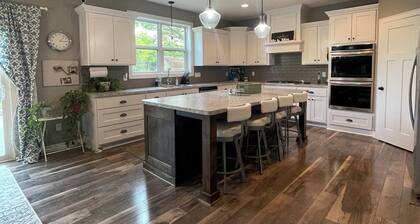 5 bedrooms, lots of space indoors & out for entertaining, close to golf courses!