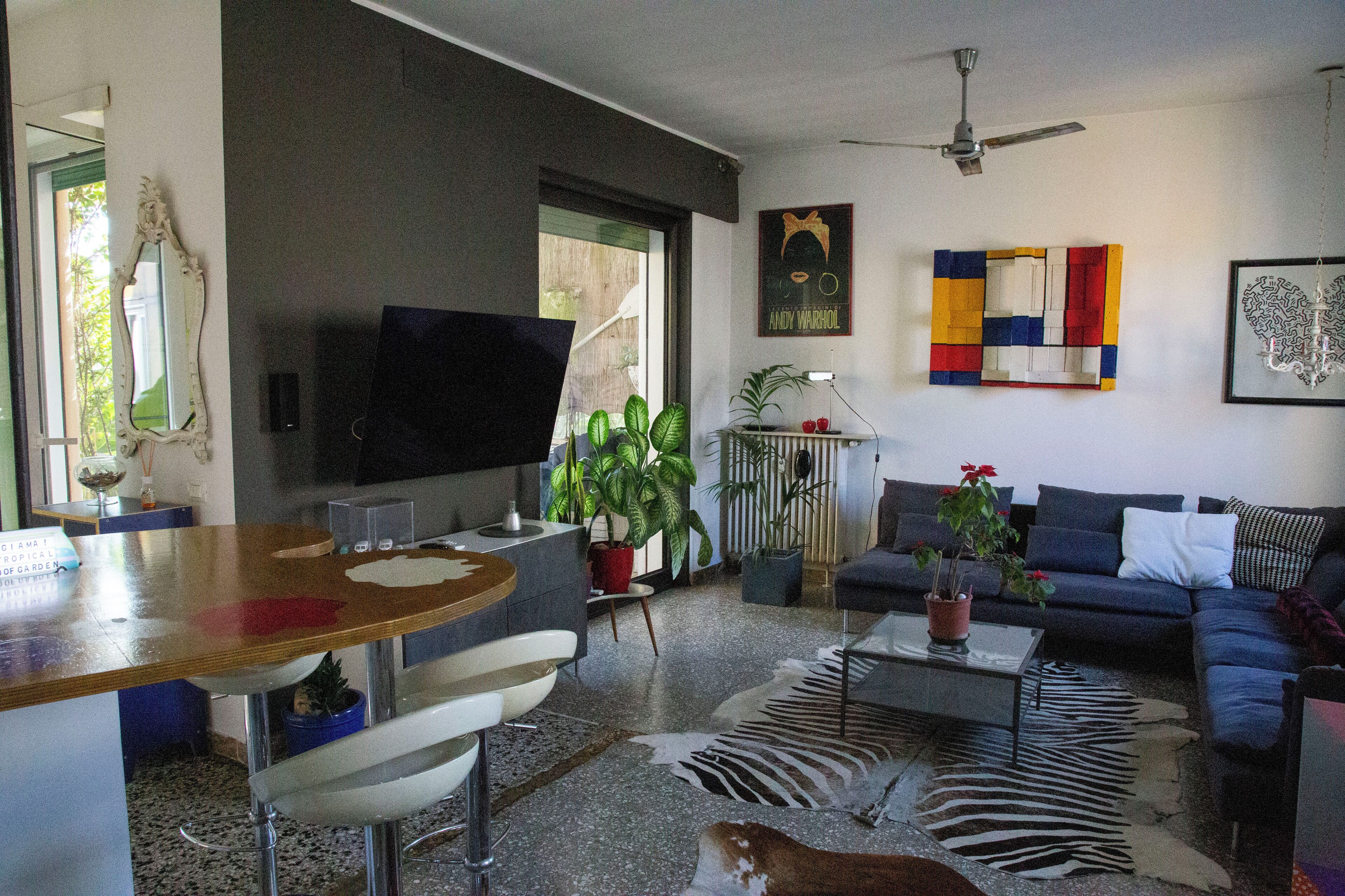 Attico con terrazzo tropicale