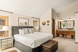 A bedroom with a large bed, a nightstand, a dresser, a mirror, and a window. - Mountain Views! Near Ski Run & Free Ski Shuttle (Breckenridge)
