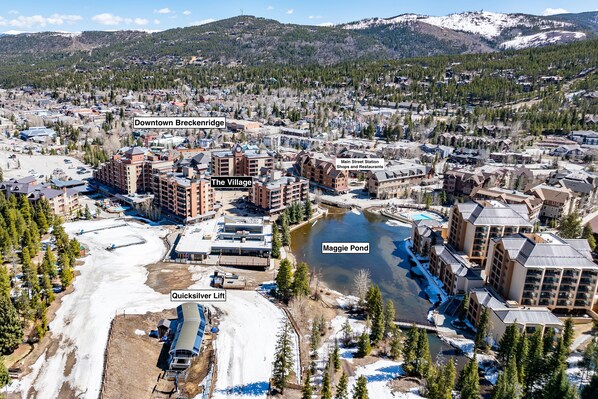 An aerial view of Downtown Breckenridge with labeled features including The Village, Main Street Station, and Maggie Pond.