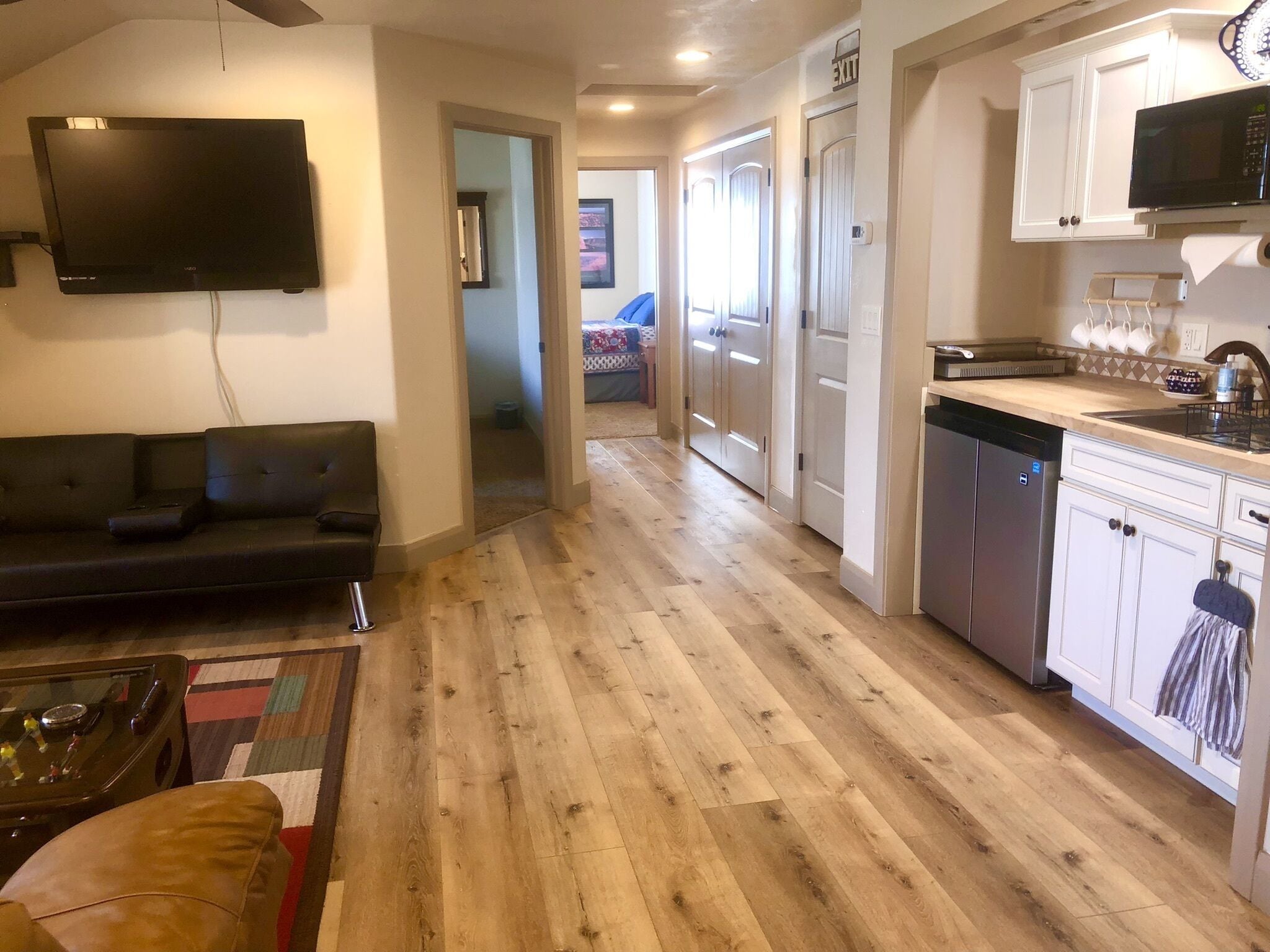 Smart TV, DVD player, foosball, books