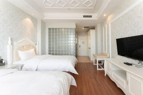 Xinwei Business Hotel