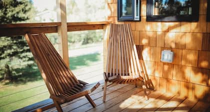 It is a tiny home in the treehouse located in the middle of Fairbanks.