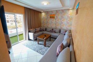 Comfort Apartment, 1 Queen Bed | Living area | 65-cm Smart TV with satellite channels - GREAT HOLIDAY RESIDENCE (Agadir)