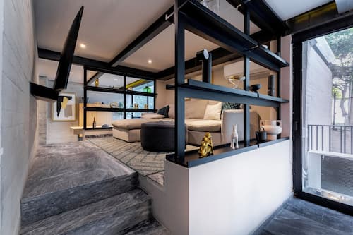 Superior Apartment, 3 Bedrooms, Balcony | Living room | 55-inch LED TV with cable channels, TV, smart speakers