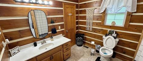 Combined shower/tub, hair dryer, towels, toilet paper