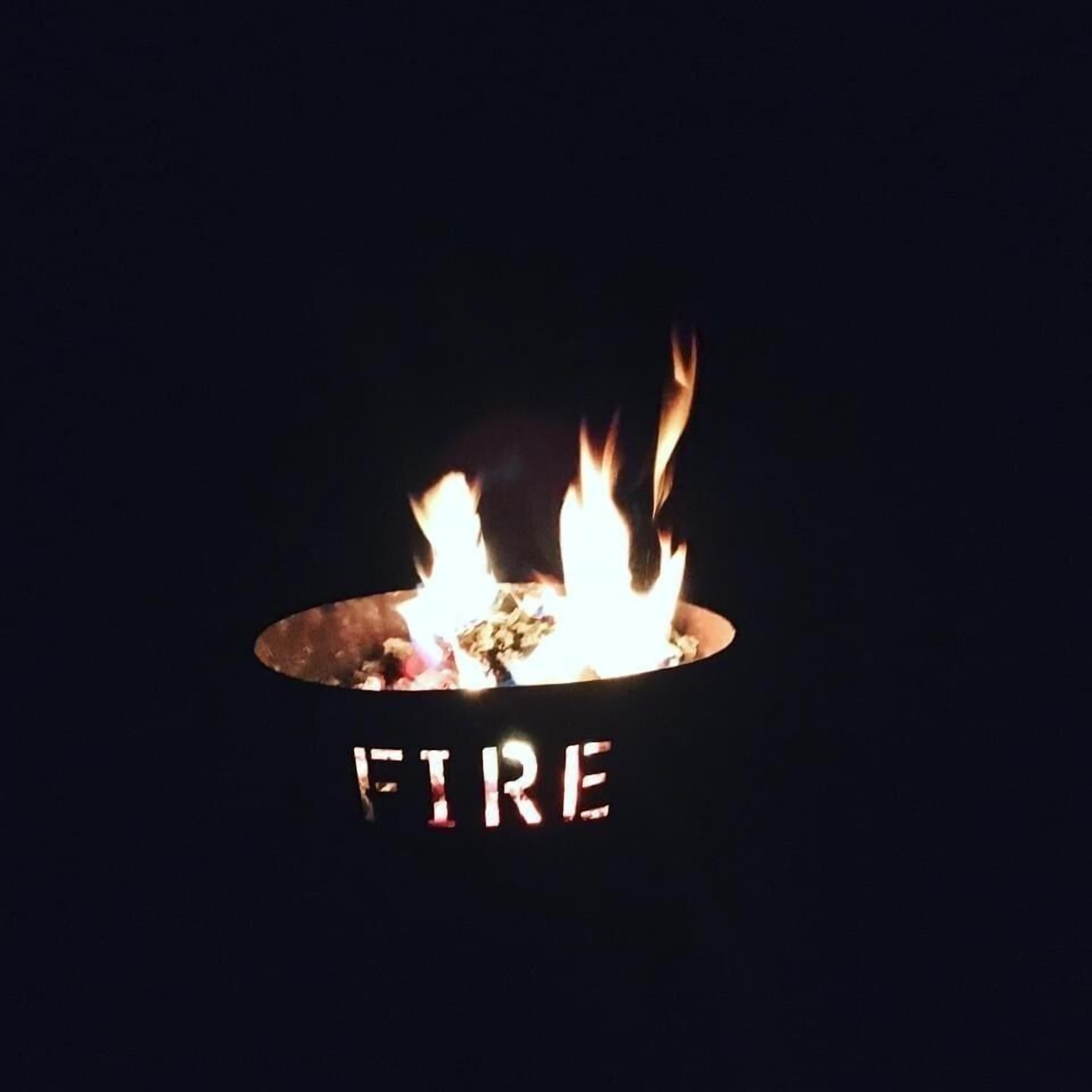 A campfire with the word "FIRE" written on the fire pit.