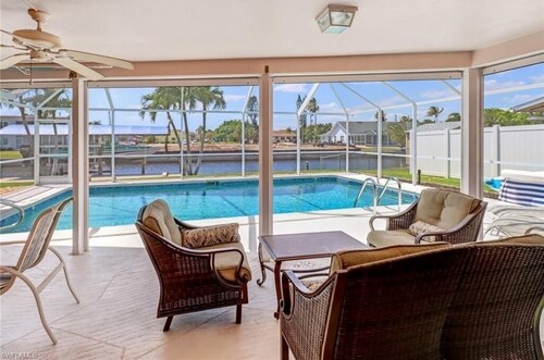 Great location, beautiful home on water w/pool, kayaks, fishing, bikes, & more!