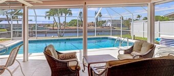 Great location, beautiful home on water w/pool, kayaks, fishing, bikes, & more!