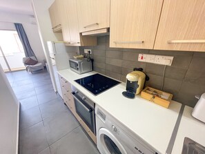 Standard Apartment | Private kitchen | Fridge, microwave, oven, stovetop - High Speed Holiday Apartment (Larnaca)