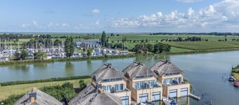 Thatched house with water views