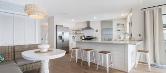 Luxury Gulf-Access Lakefront Retreat | Heated Pool, Spa, Bikes, Kayaks & Dock
