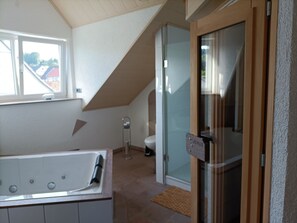 Shower, jetted tub, hair dryer, towels