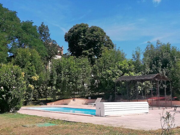 Seasonal outdoor pool, pool umbrellas, pool loungers