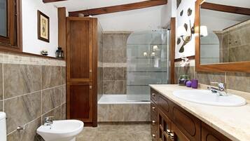 Bathtub, hair dryer, towels