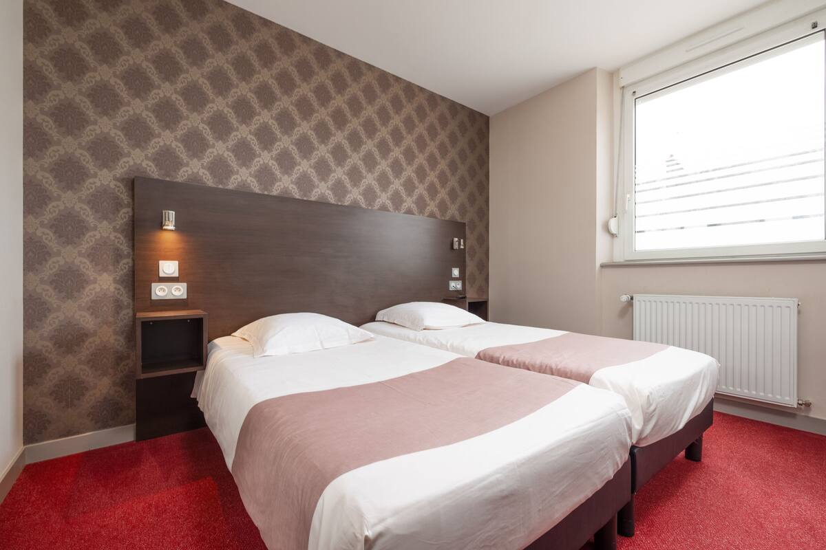 Eenvoudige Twin kamer | Gratis wifi, beddengoed