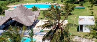 Beachfront studio apartment in a diani beach area with a 180 degree ocean views.