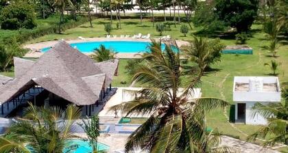 Beachfront studio apartment in a diani beach area with a 180 degree ocean views.