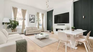 Smart TV, chimenea, estéreo y oficina