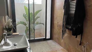 Shower, towels, toilet paper