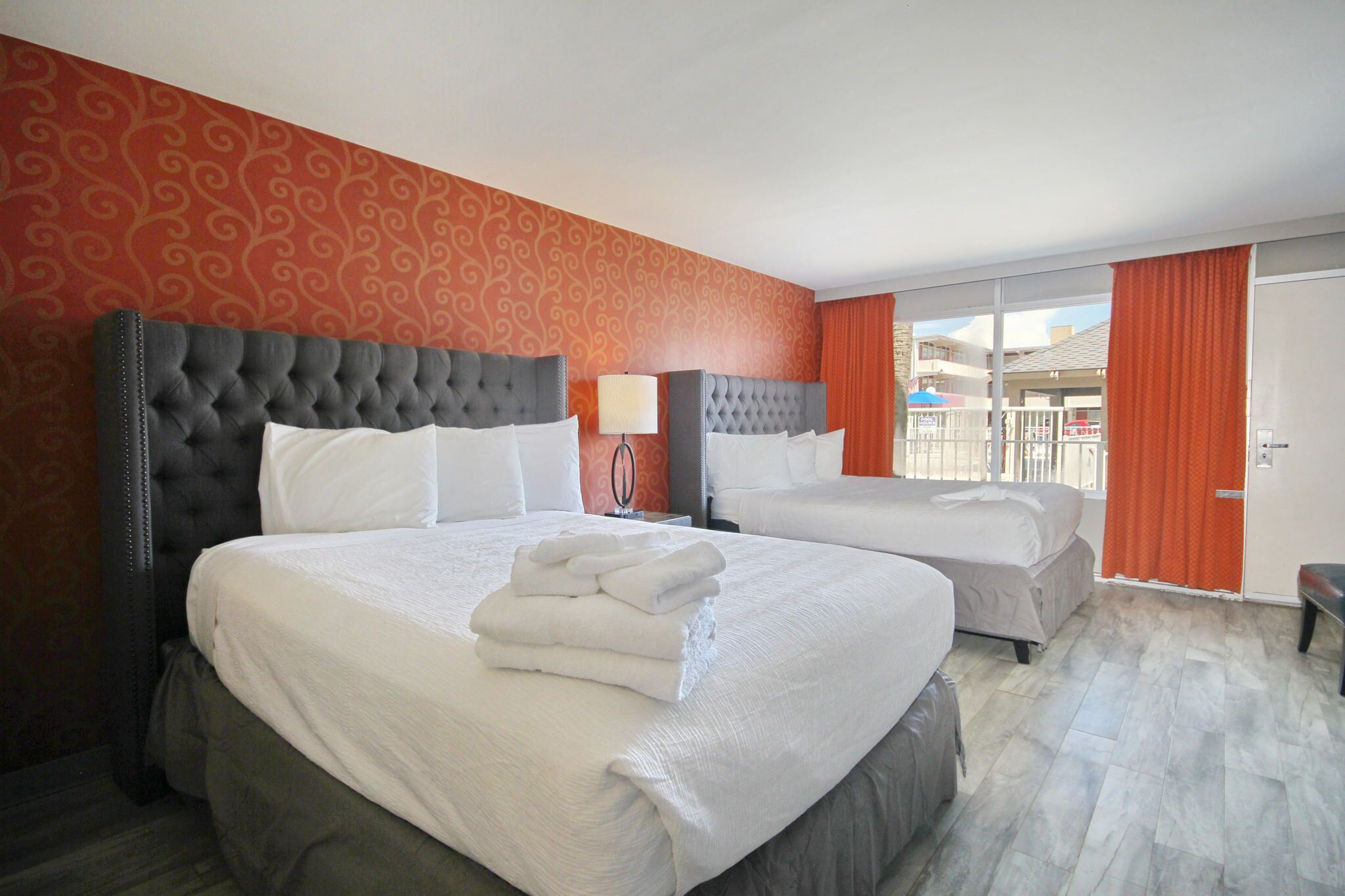 Unwind in Pool View Bliss: Double Queen Room 130