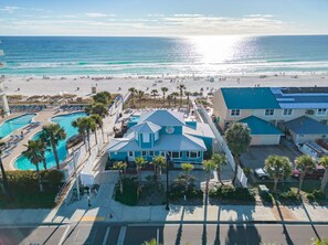 A beachfront hotel with multiple swimming pools, a beach view, and a parking area. - Private Getaway w/beach access, 11 pools, & more!! (Panama City Beach)